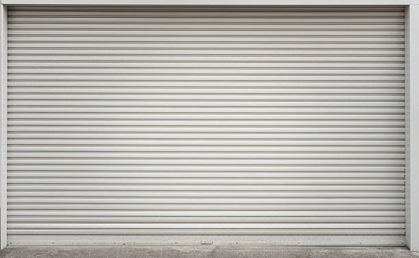 istock Metal sheet roller shutter gate of the garage house. 2240921037