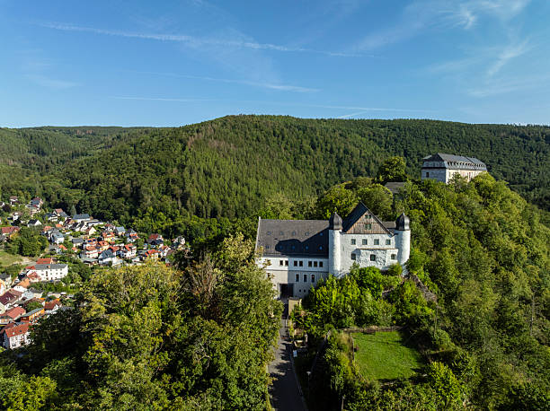 Schwarzburg, Germany - August 11, 2023: View of the Schwarzatal valley in the Thuringian Forest in summer, with the town of Schwarzburg and its castle.