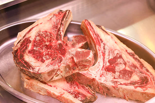 Big pieces of Raw Avila steak in a restaurant in Spain