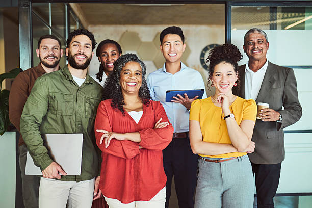 istock Happy Diverse Group of Seven Multi-Generational Business Professionals 2240930773