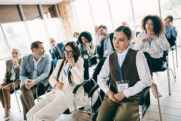 istock Professional group attending a business conference in modern office space focusing on collaboration, teamwork, and career development 2240932142