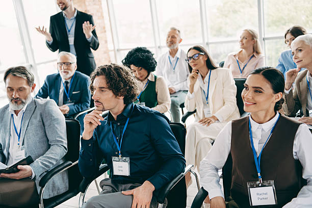 istock Diverse Businesspeople Attending an Educational Conference in a Modern Office Setting with Corporate Teamwork Atmosphere 2240932204
