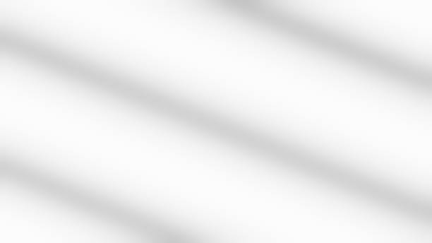 istock White wall with shadow of fence overlay. 2240932371
