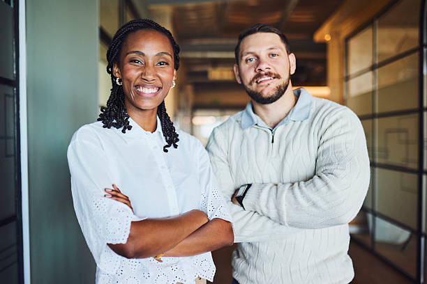 istock Confident Diverse Business Partners Posing with Arms Crossed 2240932768
