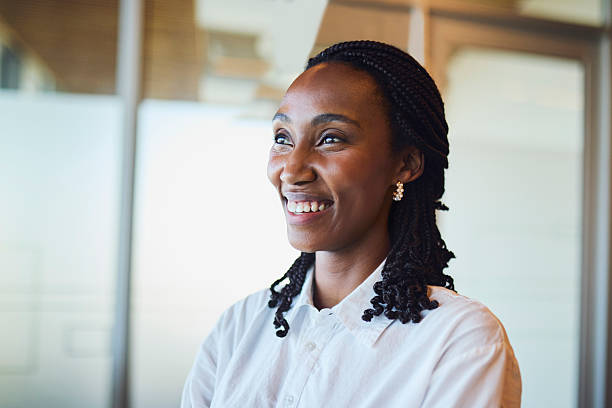 istock Happy Black Professional Woman Looking Up with Vision 2240932777