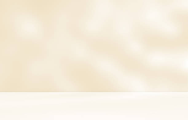 istock Empty cream beige room studio with shadow of leaves for product presentation. 2240932802