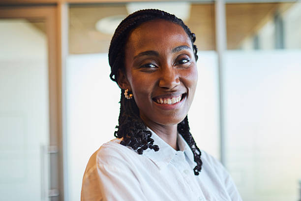 istock Confident Black Businesswoman Smiling in Modern Office 2240932807
