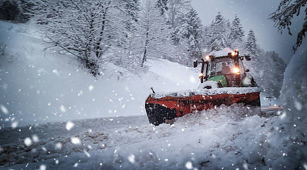 istock Snowplow Truck Clearing Mountain Road During Heavy Snowfall 2240933138