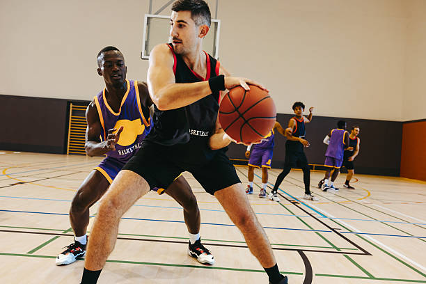 istock Basketball game with young male players 2240933399
