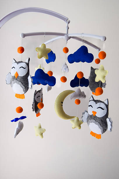 istock Handmade felt baby mobile with animals and stars — nursery decor 2240935937
