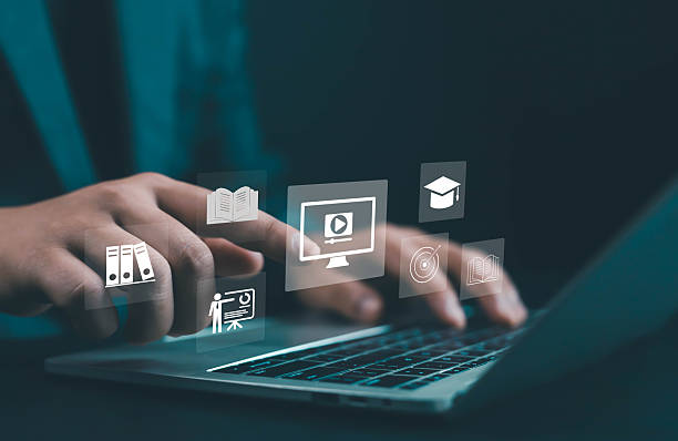 istock Businessman using laptop with virtual education e-learning icons, concept of online training, digital learning, and modern technology for professional skill development e-learning, academic study, 2240942171