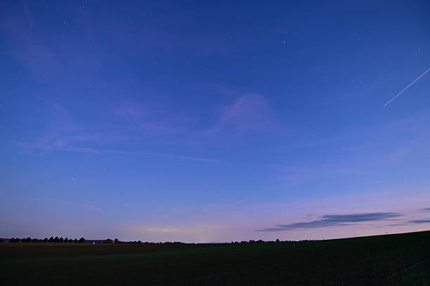 istock Night sky with stars atmospheric landscape. 2240943574