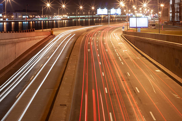 istock Traffic on the highway at night 2240949983