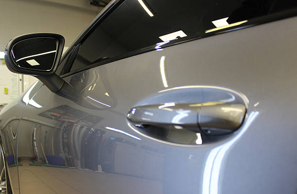istock The side of the car after being coated with a paint protective coating with a glossy effect 2240952852