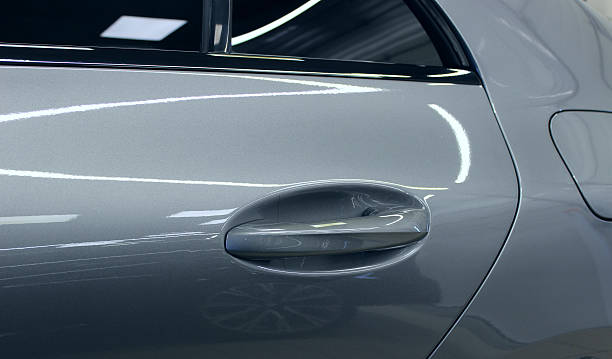 istock Metallic Colored Car Door Surface and Handle After Varnish Coating 2240952869