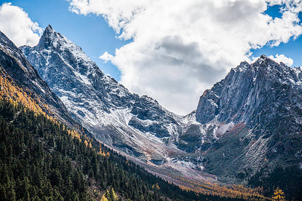 The snow capped mountains in autumn