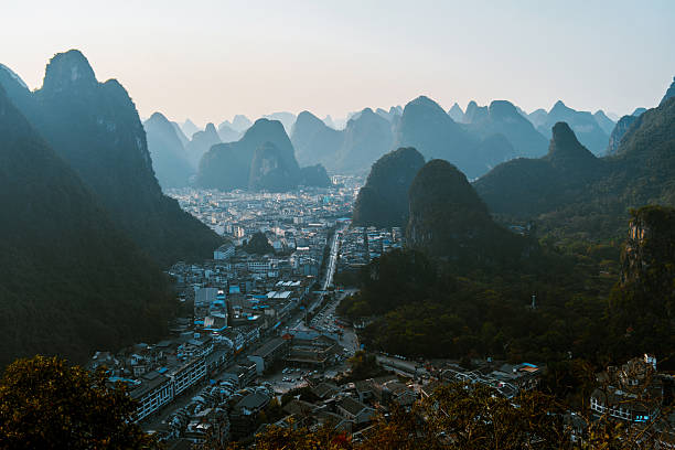 Scenic high angle view from mountain at river in Yangshuo, Guilin, China at sunset