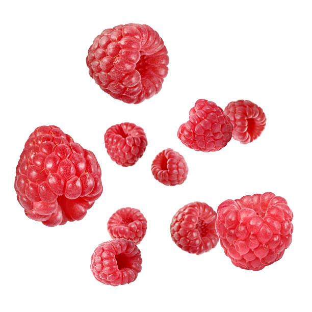 istock Fresh raspberries swirling in air against white background 2240958126
