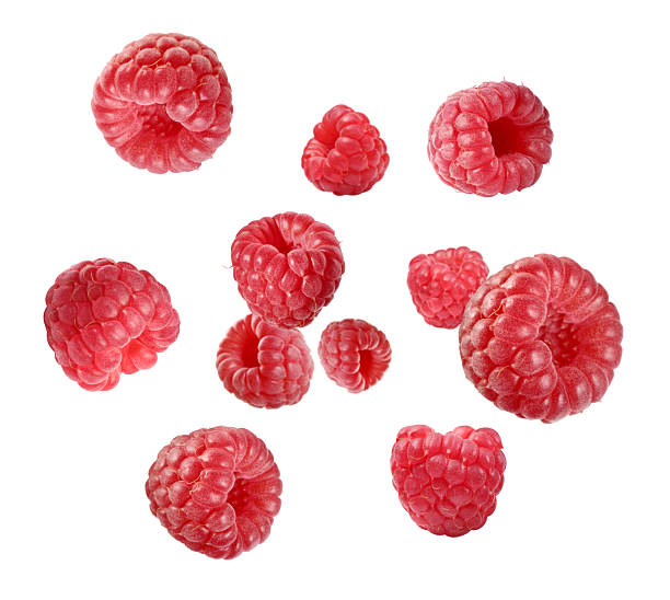 istock Fresh raspberries swirling in air against white background 2240958362