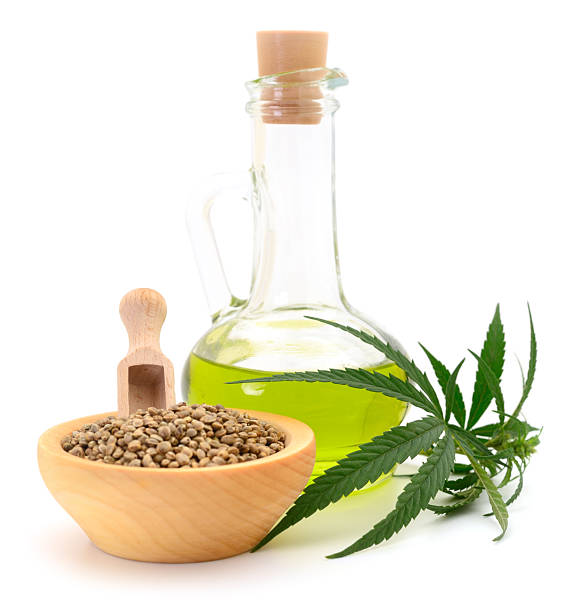 istock Hemp oil and seeds isolated on white background 2240959516