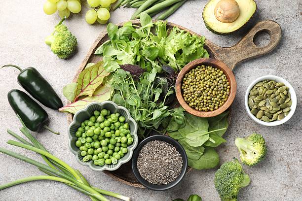 istock Superfood. Different healthy products on light grey table, flat lay 2240959834