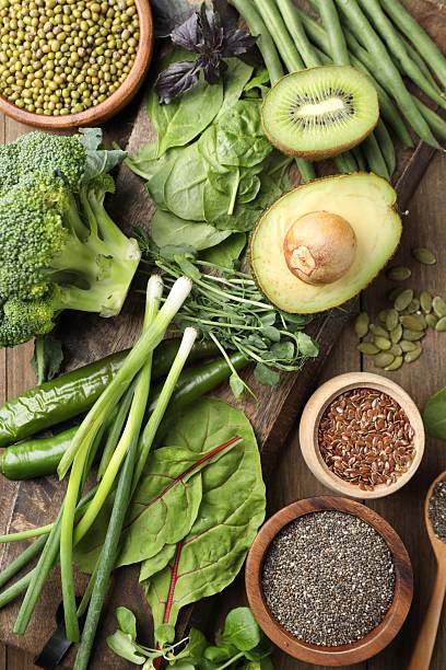 Superfood. Different healthy products on wooden table, flat lay