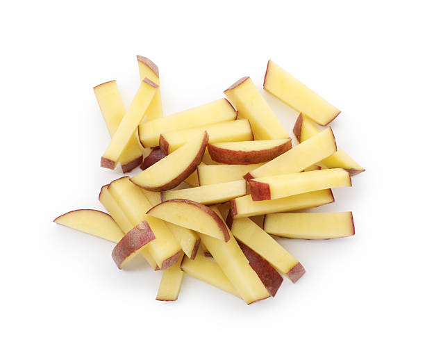 istock Pieces of fresh red potatoes isolated on white, top view 2240961241
