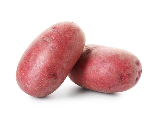 istock Fresh ripe red potatoes isolated on white 2240961300