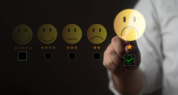 istock Man pressing unhappy customer feedback icon, concept of poor service review, dissatisfaction. 2240965903