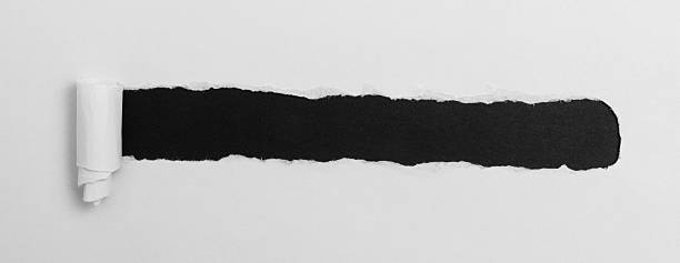 istock Tear open the white paper on the black paper 2240966471