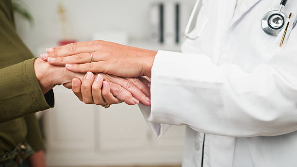 istock Compassionate Doctor Offers Gentle Support To Patient With Shared Hands And Care 2240973881
