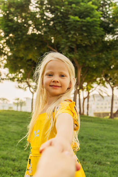 Close-Up Portrait Of Cute Blond Girl