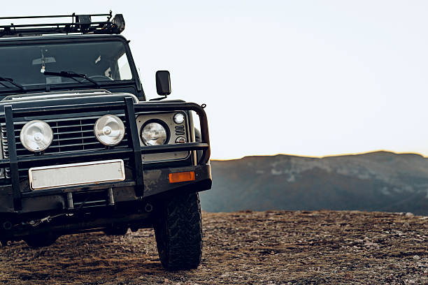istock Dark green off-road car in the mountains 2240981417