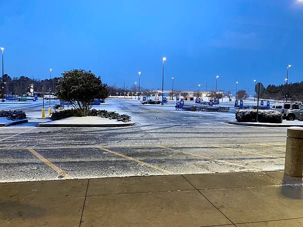 istock Early Morning Snow in Parking Lot 2240984661