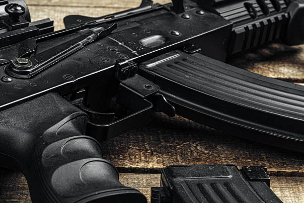 istock Russian automatic rifle Ak-47 close up, military weapon 2240985481