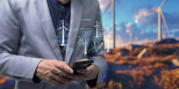 istock hologram screen Humans controlling the system Wind turbines produce electricity. Eco queue, clean energy from nature. 2240987842