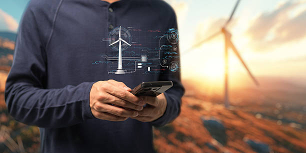 istock hologram screen Humans controlling the system Wind turbines produce electricity. Eco queue, clean energy from nature. 2240987869