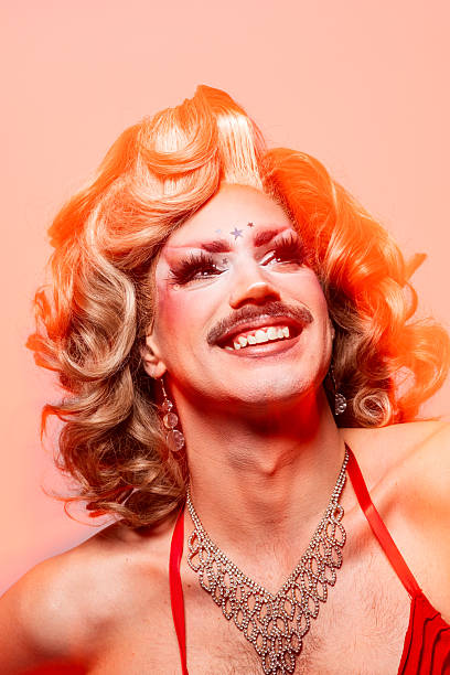 istock Smiling Celebration of Queer Pride and Self-Expression in Vibrant Costume and Makeup 2240994584