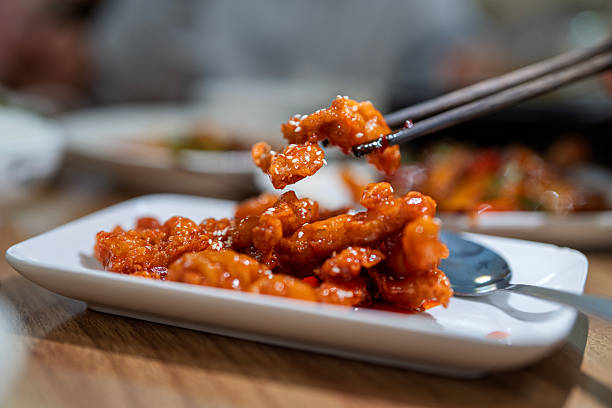 istock Sweet and sour pork served on white plate 2240994850