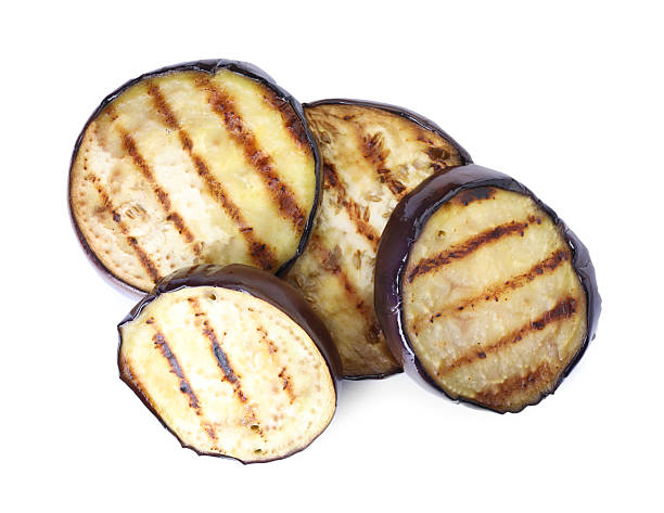 istock Grilled slices of eggplant isolated on white, top view 2240999024