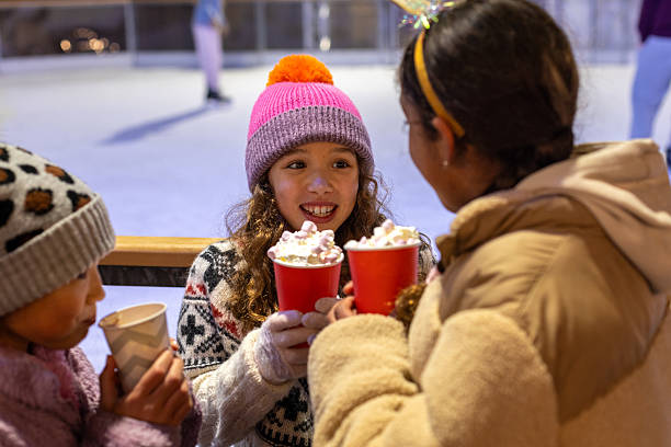 istock Christmas Hot Chocolates at the Ice Rink 2241000931