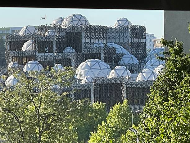 istock National Library of Kosovo domes above treetops 2241005334