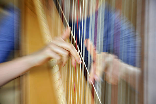 istock Harpist fingers in motion 2241008803