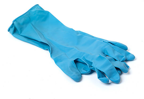 Blue rubber gloves offering protection for hands during cleaning tasks on white background