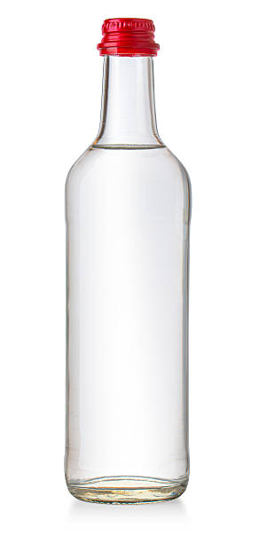 istock Miniature vodka bottle with red cap on white background 2241011428