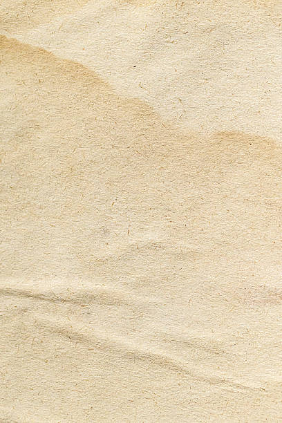 istock Beige vintage paper texture background with aged effect 2241011573