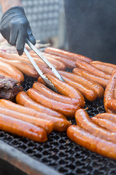 istock delicious chorizos or sausages on the grill 2241016434