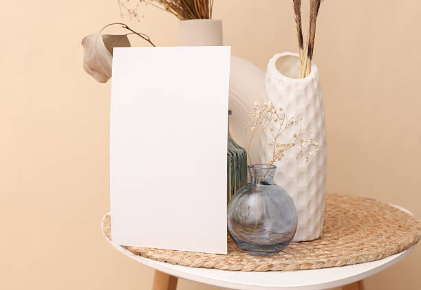 istock Blank card and Minimalist modern vases with dry grass on a table. Mockup for design 2241017953