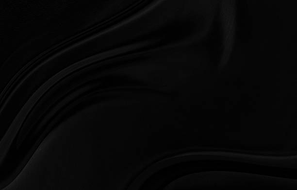 istock Black gray satin dark fabric texture luxurious shiny that is abstract silk cloth background with patterns soft waves blur beautiful. 2241025468
