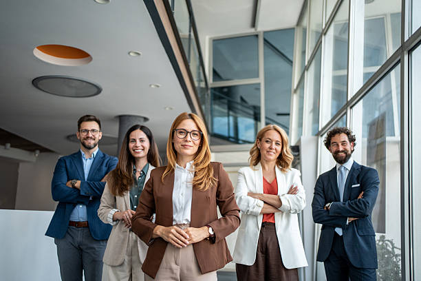 istock Diverse business team smiling with confidence in modern office 2241029584